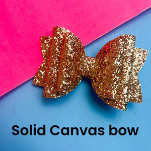 Solid canvas bow(you pick color)